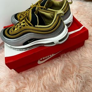 Gold and black sneakers